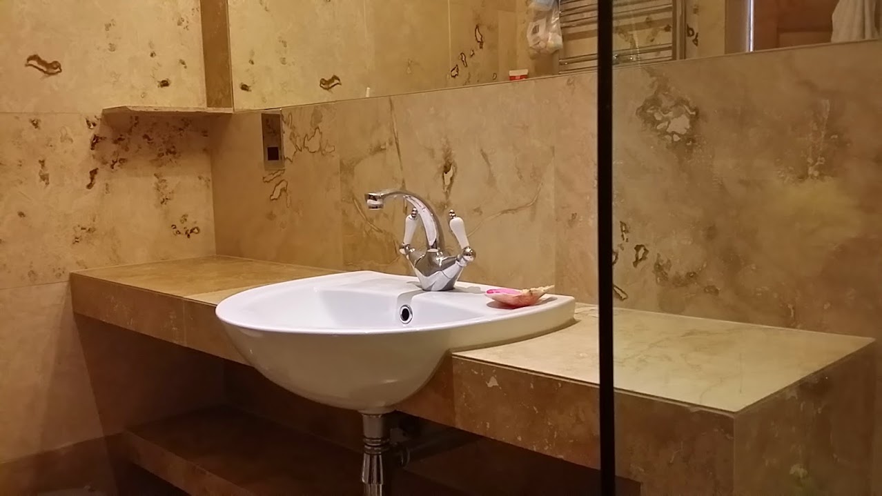 A1 Group - Travertine shower room installation – Dudingstone Vilige Edinburgh